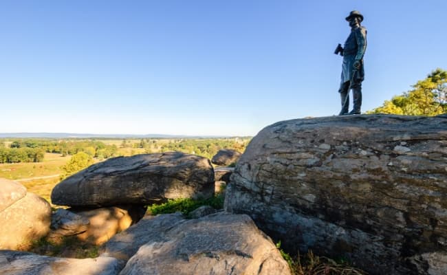 A statue overlooking a park at Gettysburg National Military Park