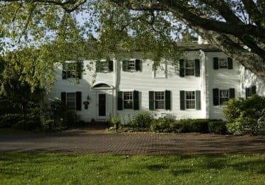 Exterior of captain's house - white two-story house