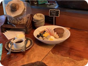 counter with breakfast items including fruit and cereal