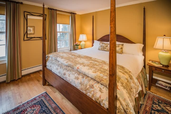 Dorset interior of bedroom with four poster bed