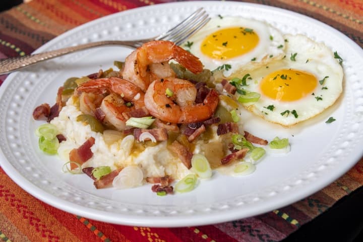 Breakfast shrimp and grits with eggs