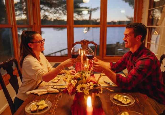 A couple enjoying a romantic dinner in the sunporch