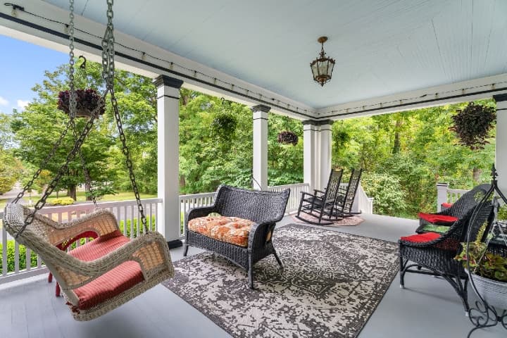 A wraparound porch made for lingering, just as it has for generations.