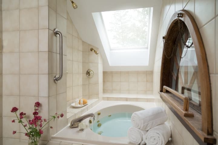 bathroom with full bathtub
