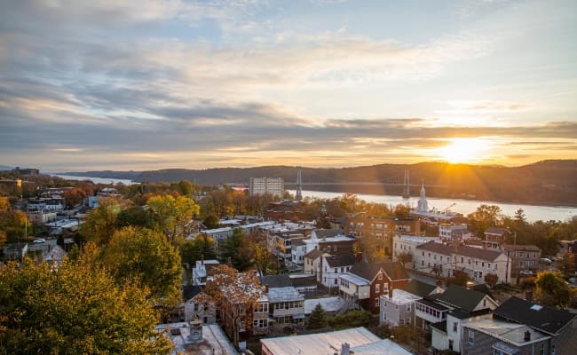 The sun setting over a town in Hudson Valley.