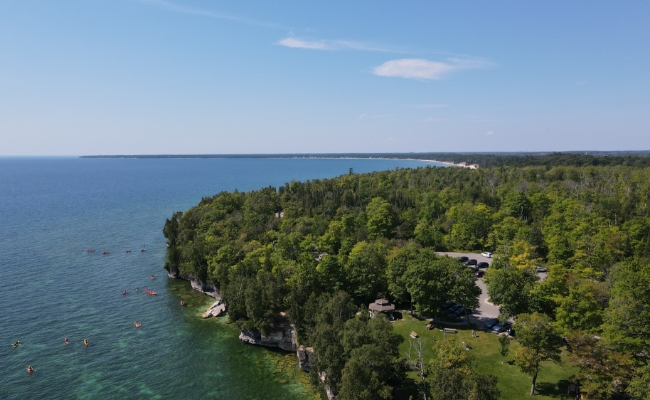 An aerial view of a green forest in Door County, Wisconsin.