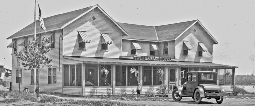 Historic Hotel Saugutuck in Michigan with a classic car in front