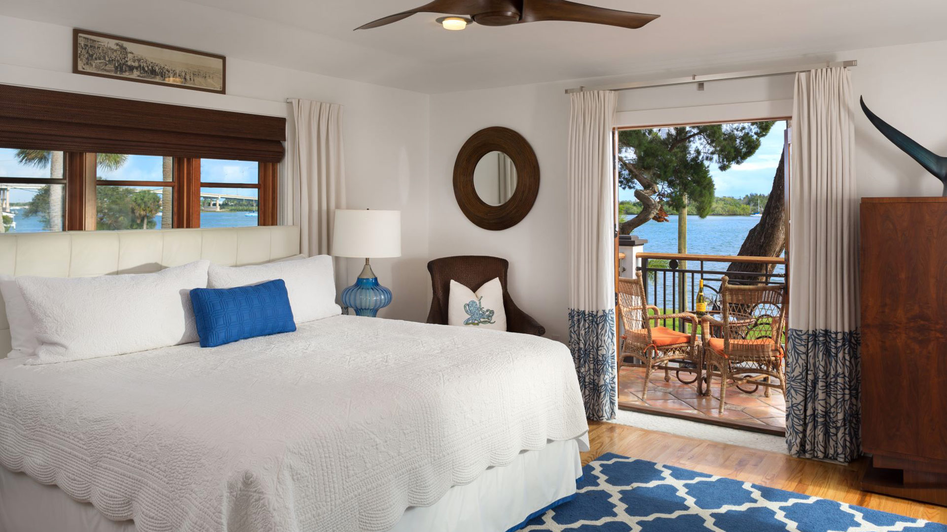 Elegant guest rooms with waterfront views are available at the Black Dolphin Inn in New Smyrna Beach.