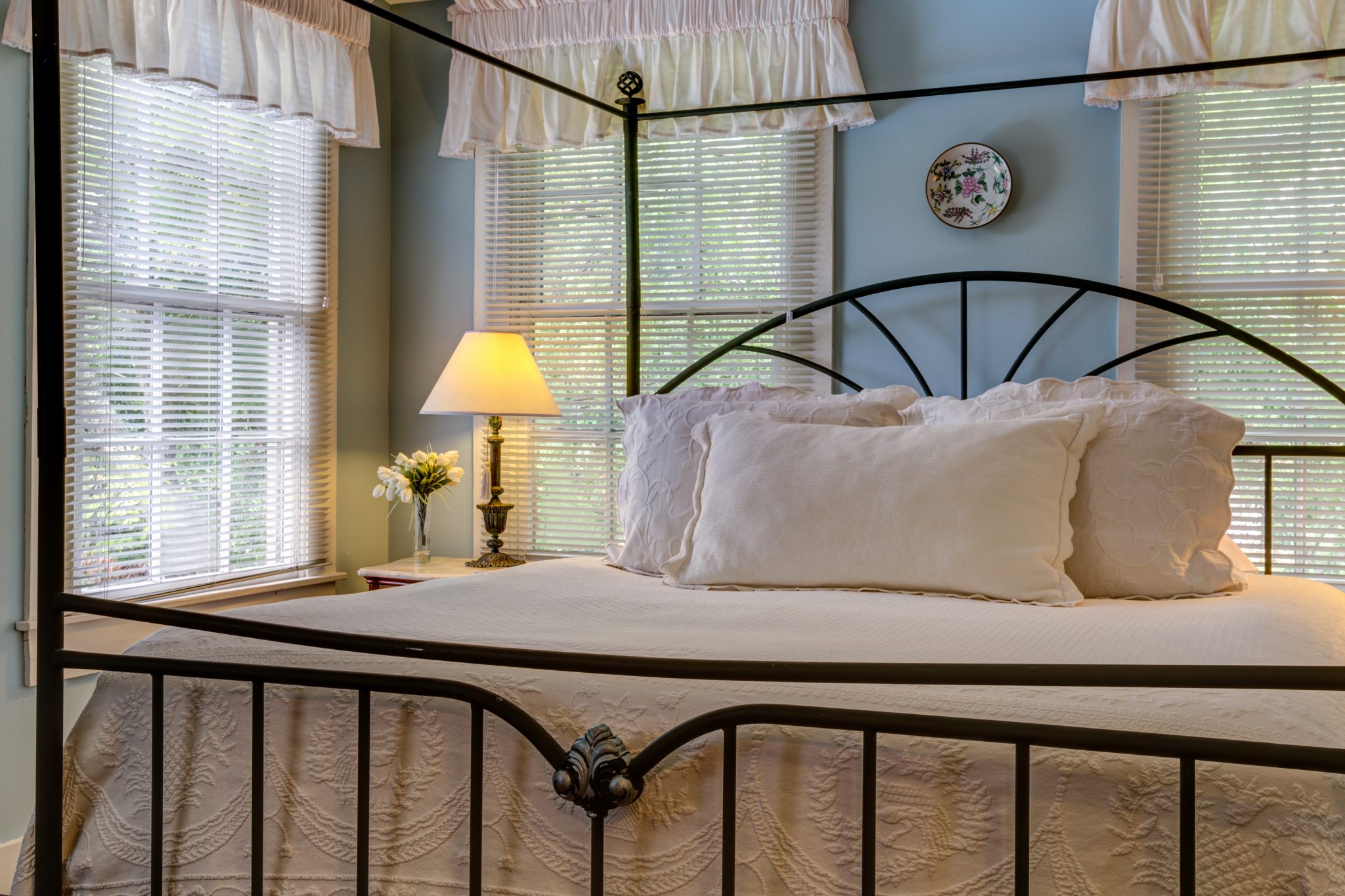 beautiful suite in the fairbanks house on amelia island features cream and white interior decor