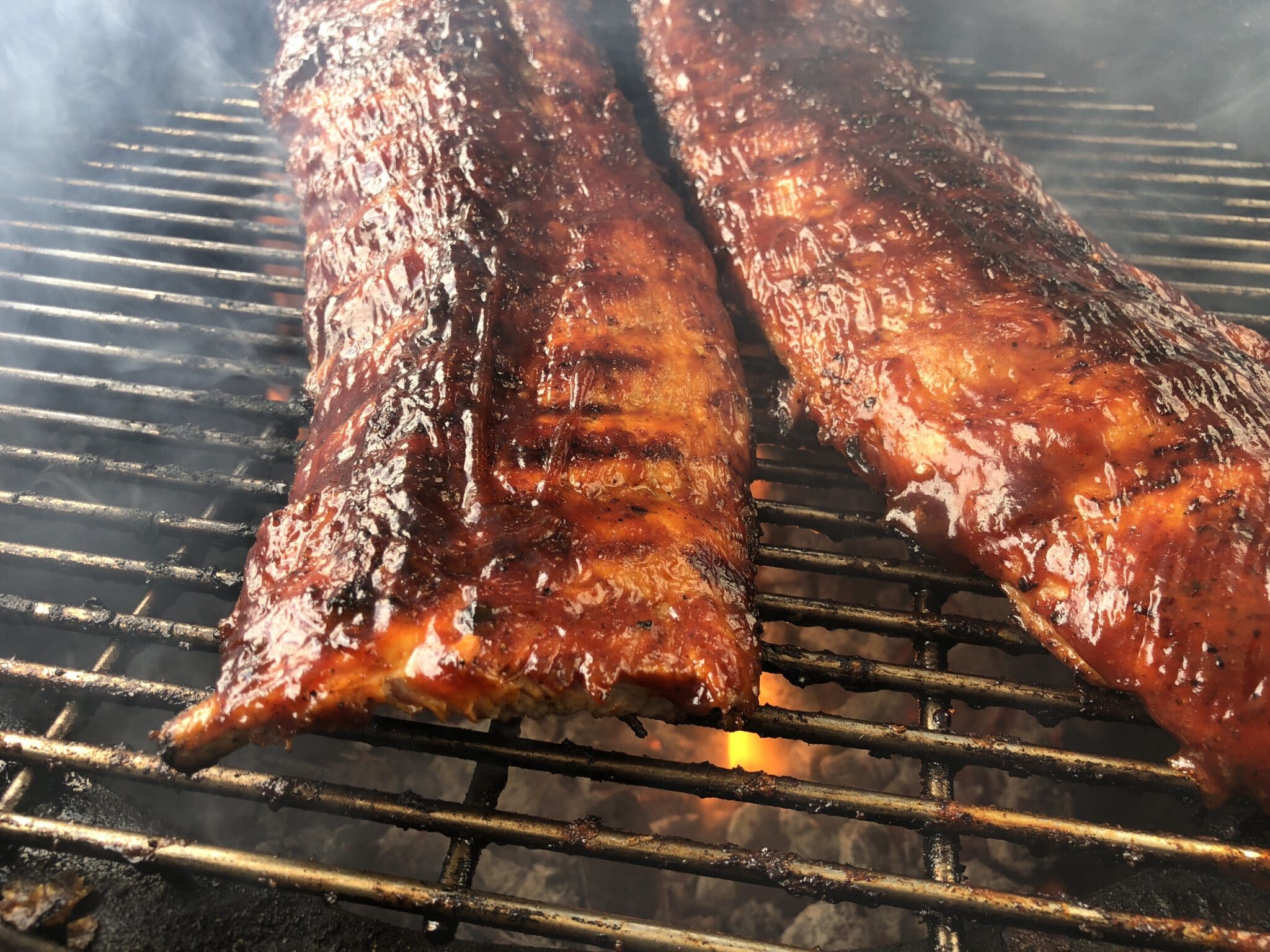 BBQ ribs on a flame grill