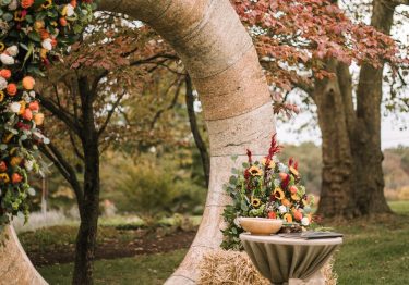 Round stone sculpture with flowers for wedding