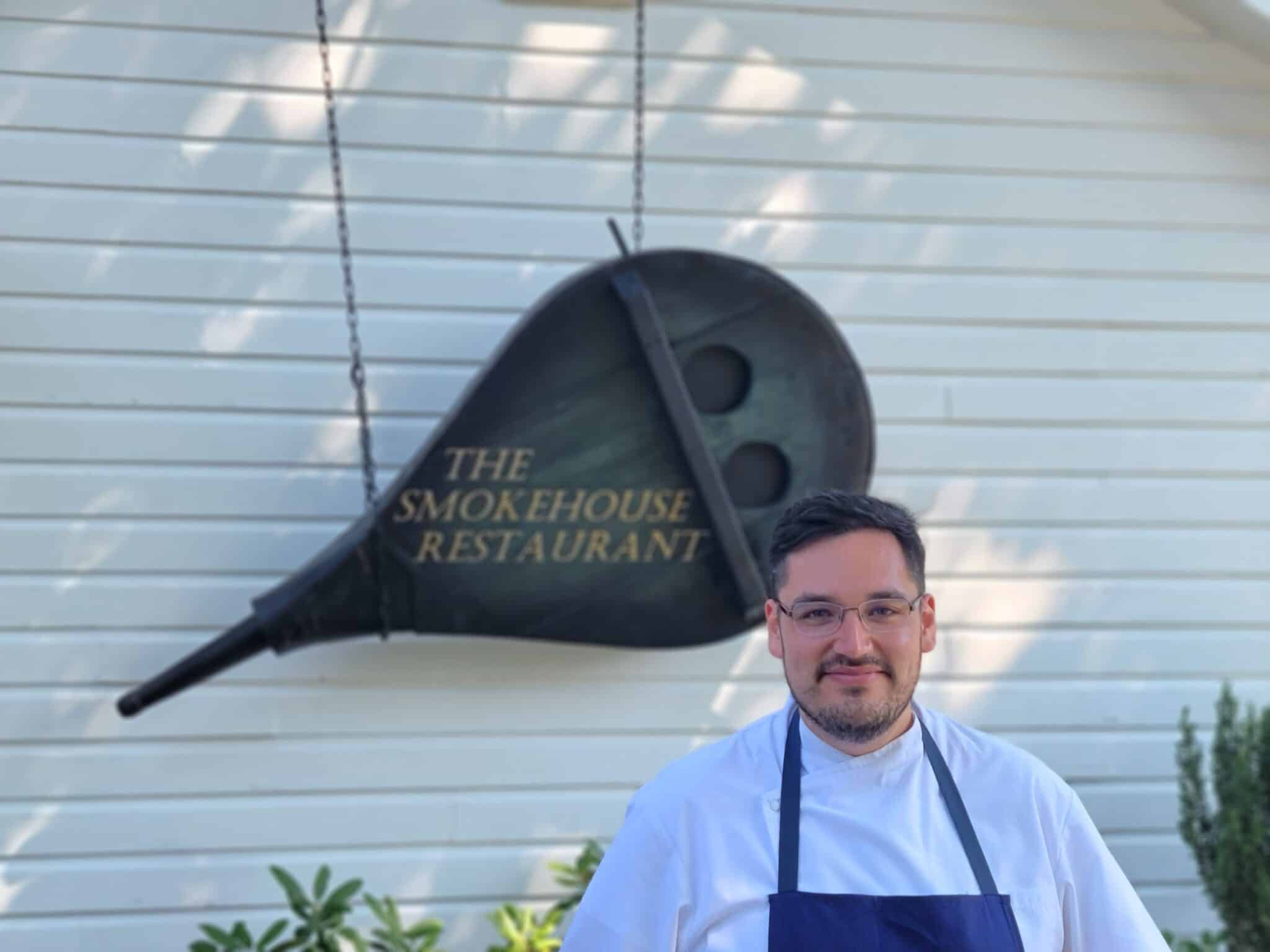 Chef standing outside of Smokehouse Restaurant at Antrim 1844
