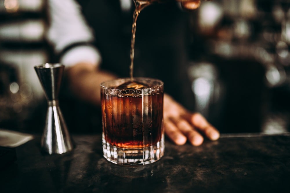 A delicious drink being poured on the Kentucky Bourbon Trail