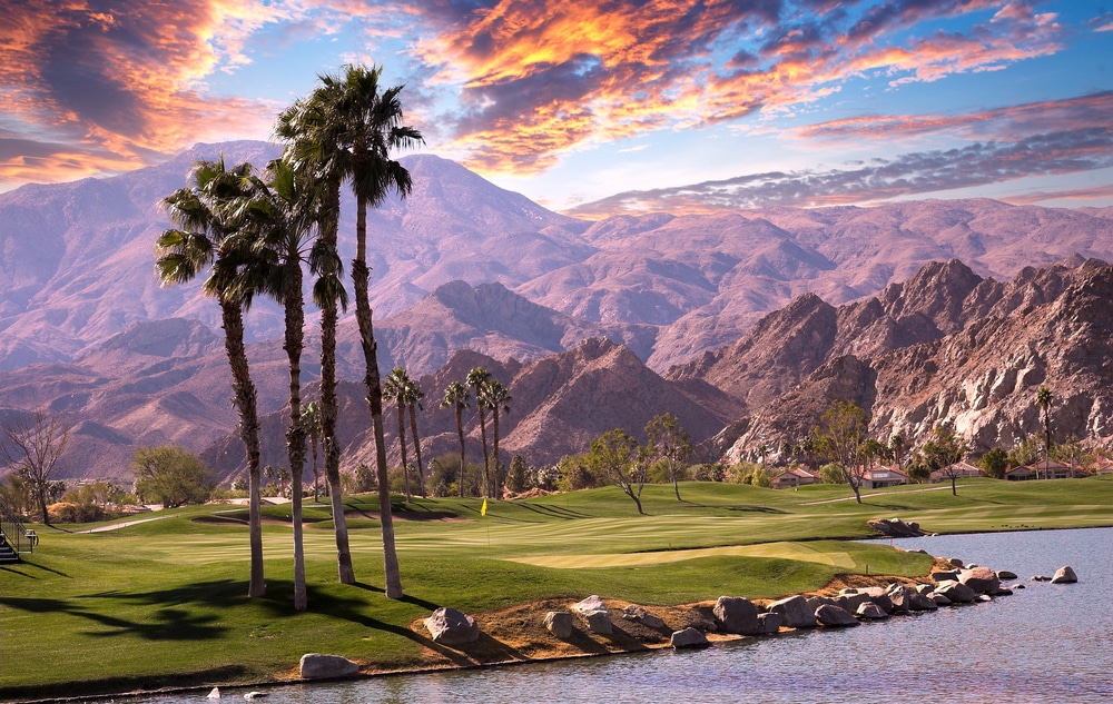 golf course by mountains