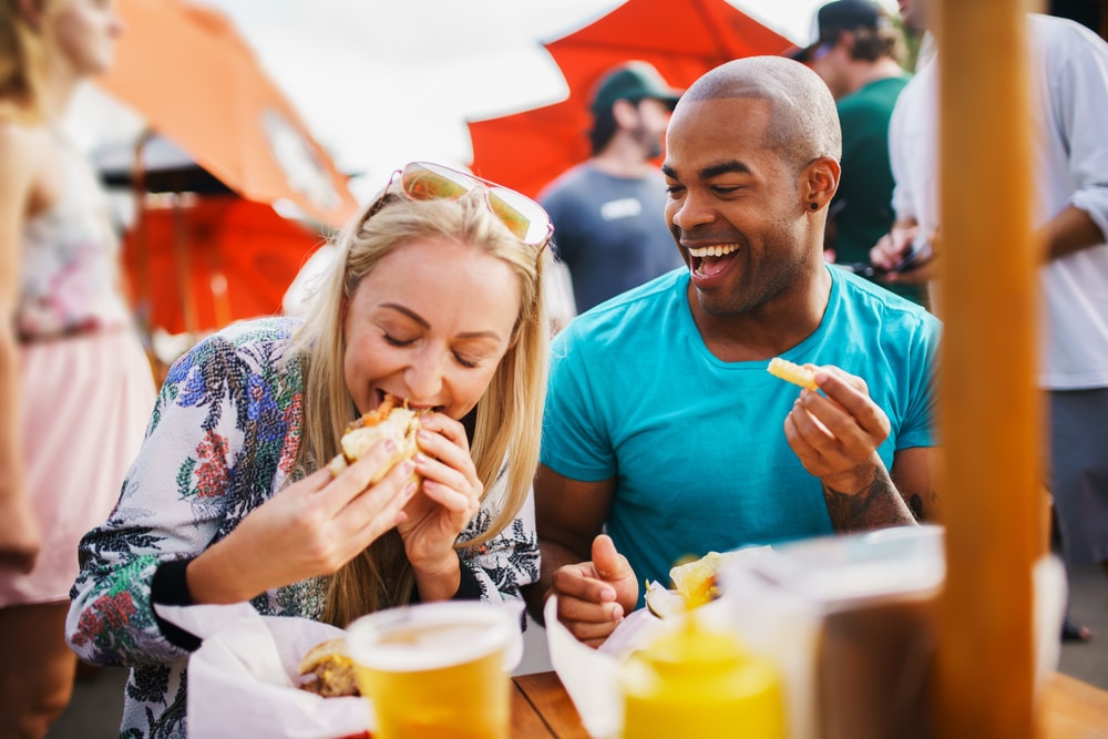 A couple enjoying great food and beer this summer in Leavenworth