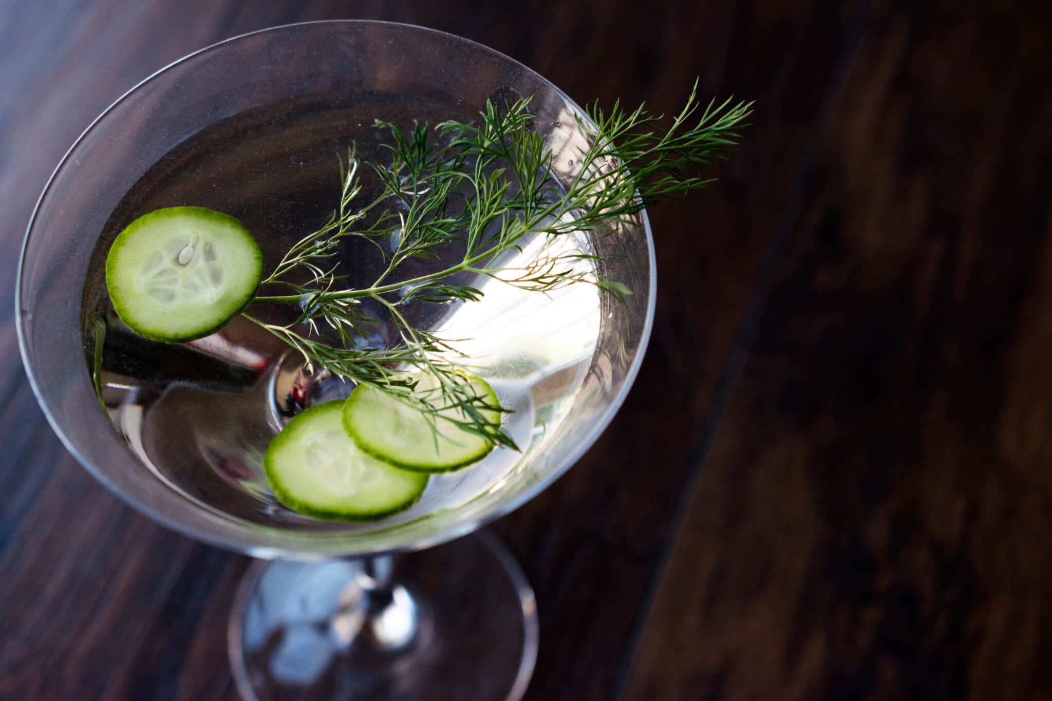 Fresh Dill Martini Cocktail with Cucumber Slices.