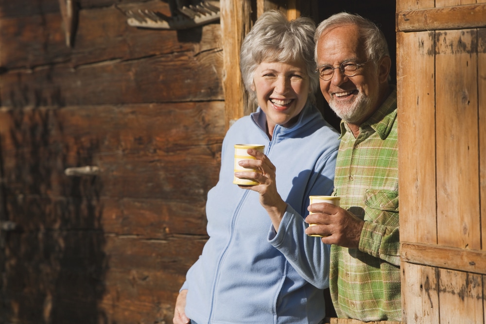 A senior couple enjoying romantic cabin getaways
